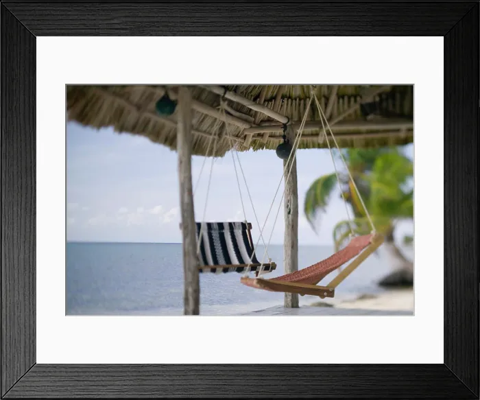 Framed Print : Swinging Chairs at Turneffe Caye resort, Belize Framed Print : Swinging Chairs at Turneffe Caye resort, Belize