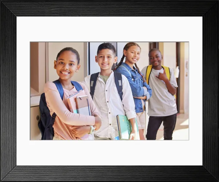 Framed Print : School, friendship and portrait of a group of children standing with backpack and books in hallway