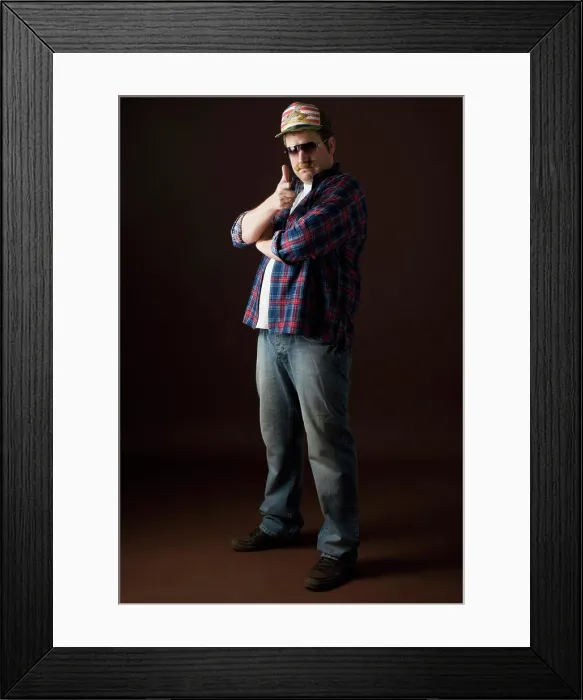Framed Print : Stereotypical American Man posing and making the bang bang hand greeting Framed Print : Stereotypical American Man posing and making the bang bang hand greeting