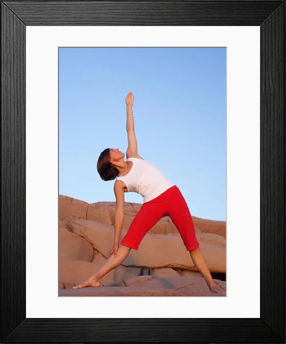 Framed Print : A woman doing yoga by the sea, Sweden Framed Print : A woman doing yoga by the sea, Sweden