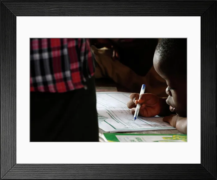 Framed Print : African primary school (Togo). Schoolboy