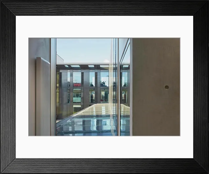 Framed Print : Window view through with glass canopy towards building link Framed Print : Window view through with glass canopy towards building link