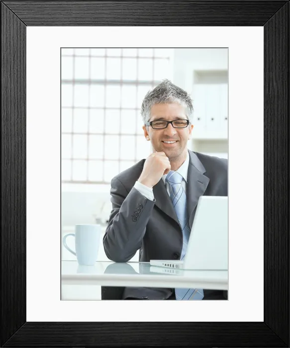 Framed Print : Businessman thinking Businessman with gray heair thinking over laptop computer Framed Print : Businessman thinking Businessman with gray heair thinking over laptop computer
