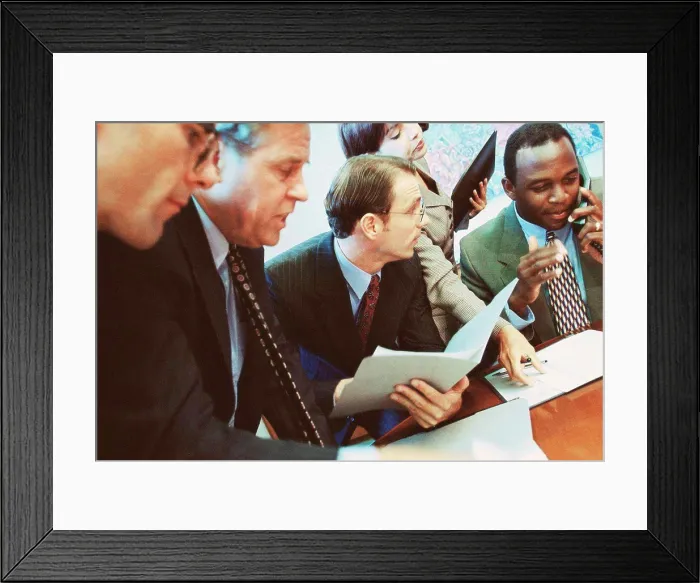 Framed Print : Business executives in a meeting Framed Print : Business executives in a meeting