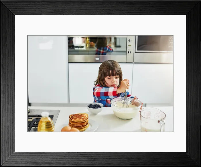 Framed Print : Boy, baking and mixing in home kitchen