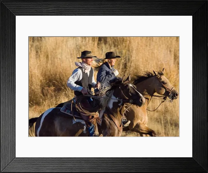 Framed Print : cowgirl and cowboy riding, Oregon, USA