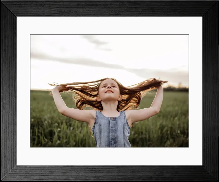 Framed Print : Happy 5 years old girl in a green wheat field with long hair at sunset Framed Print : Happy 5 years old girl in a green wheat field with long hair at sunset