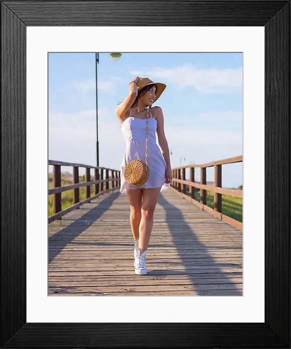 Framed Print : Portrait of caucasian brunette woman at the beach on summer vacation, walking along a wooden walkway Framed Print : Portrait of caucasian brunette woman at the beach on summer vacation, walking along a wooden walkway
