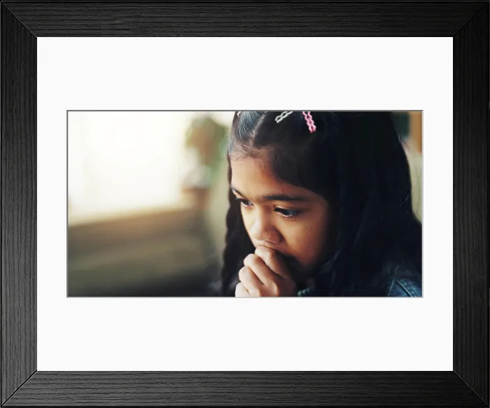 Framed Print : Stress, anxiety and girl child in therapy for consultation in trauma
