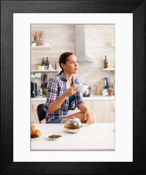 Framed Print : Dreamy girl enjoying hot green tea