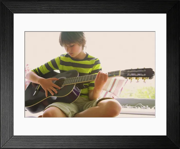 Framed Print : Boy Playing Guitar Framed Print : Boy Playing Guitar