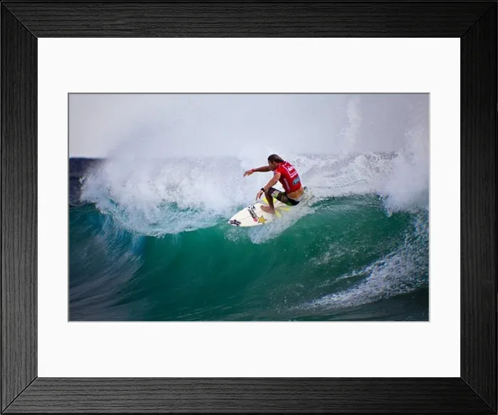Framed Print : Surfer races at the Quiksilver and Roxy Pro World Title Event, Snapper Rocks, Gold Coast, Australia Framed Print : Surfer races at the Quiksilver and Roxy Pro World Title Event, Snapper Rocks, Gold Coast, Australia