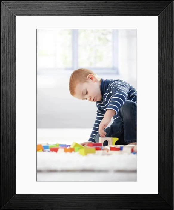 Framed Print : Gingerish boy playing with cubes Gingerish little boy playing with building cubes at home on floor Framed Print : Gingerish boy playing with cubes Gingerish little boy playing with building cubes at home on floor