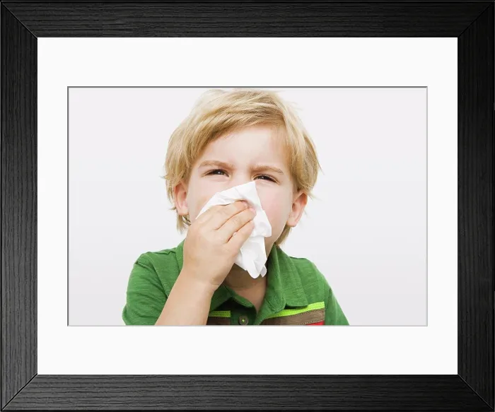 Framed Print : Boy blowing nose Framed Print : Boy blowing nose