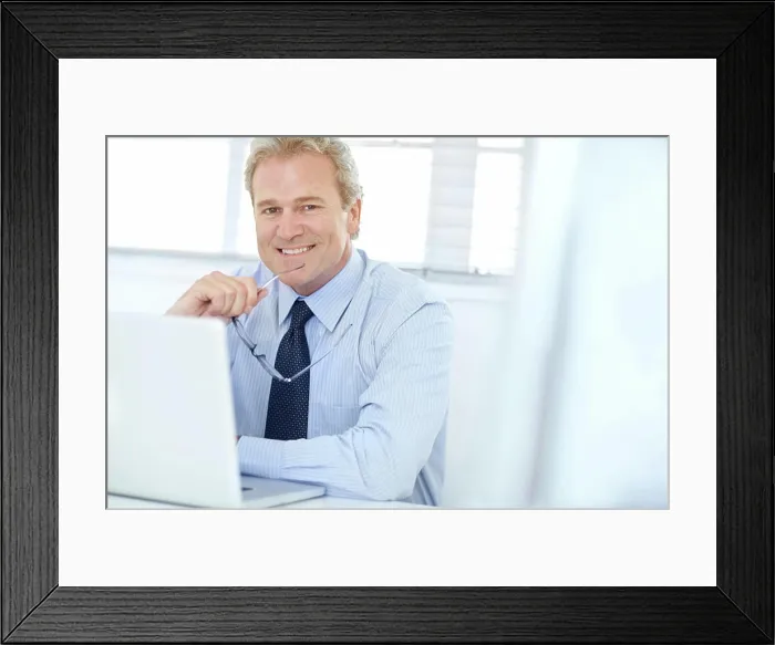 Framed Print : Man, portrait and laptop for financial advisor in office