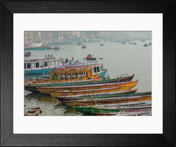 Framed Print : India, Uttar Pradesh, Varanasi. Boats moored along the banks of the Ganges River Framed Print : India, Uttar Pradesh, Varanasi. Boats moored along the banks of the Ganges River