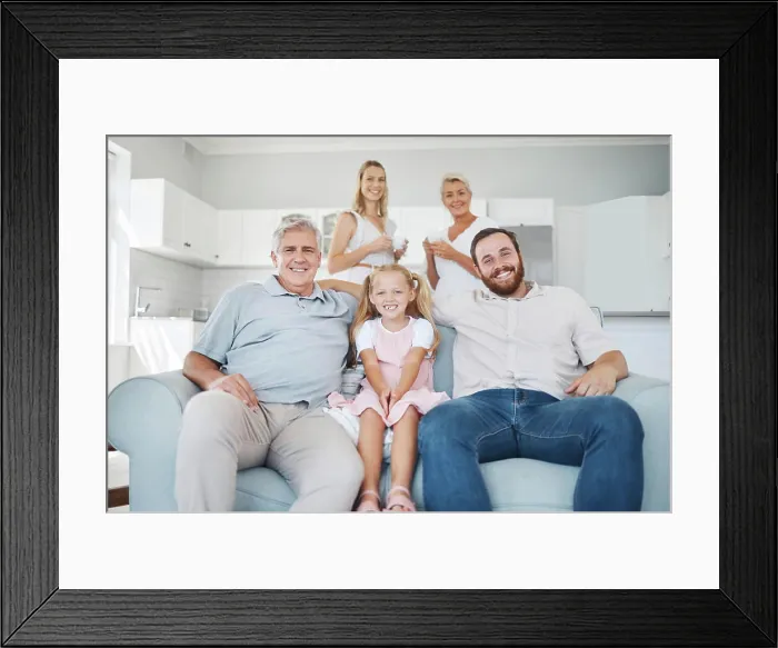 Framed Print : Relax, smile and portrait of happy big family sitting on sofa in the living room of their home Framed Print : Relax, smile and portrait of happy big family sitting on sofa in the living room of their home