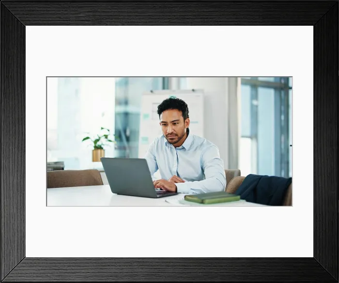 Framed Print : Review, laptop and research with business man in office for assets Framed Print : Review, laptop and research with business man in office for assets