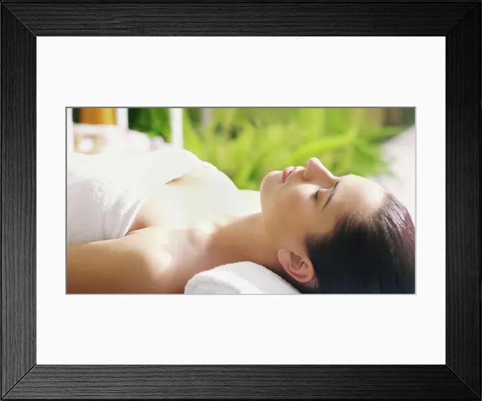 Framed Print : Spa, relax and woman on massage table for stress relief