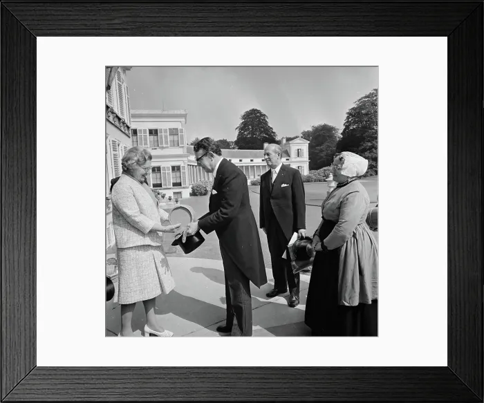 Framed Print : Anefo photo collection. Queen Juliana gets Vaat Haring offered at Soestdijk Palace by woman in traditional costume Framed Print : Anefo photo collection. Queen Juliana gets Vaat Haring offered at Soestdijk Palace by woman in traditional costume