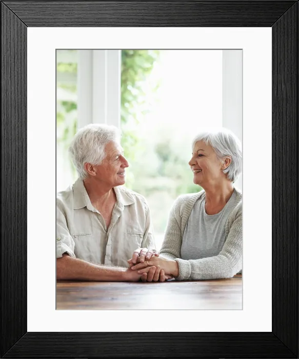 Framed Print : Happy senior couple holding hands in support Framed Print : Happy senior couple holding hands in support