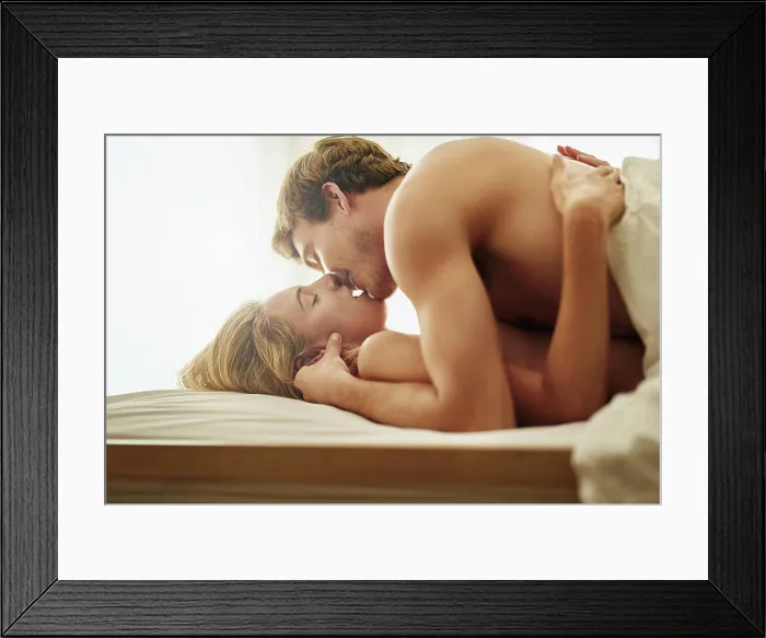 Framed Print : Love, kiss and couple in bed, intimate and romantic with foreplay Framed Print : Love, kiss and couple in bed, intimate and romantic with foreplay