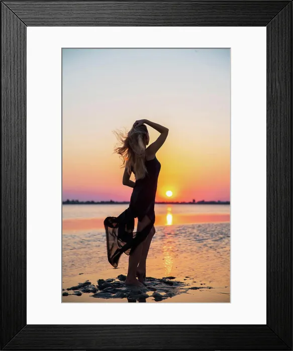 Framed Print : Pretty silhouette of a woman Pretty silhouette of a woman wearing a dress posing against the backdrop of the sea Framed Print : Pretty silhouette of a woman Pretty silhouette of a woman wearing a dress posing against the backdrop of the sea