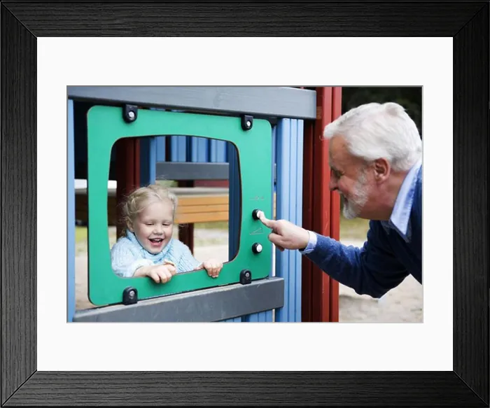 Framed Print : Grandfather and grandchild playing together on a playground, Sweden Framed Print : Grandfather and grandchild playing together on a playground, Sweden