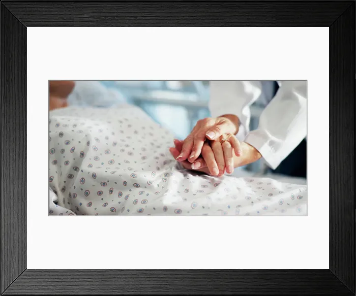 Framed Print : Holding hands, doctor and ill person in hospital bed for healthcare service Framed Print : Holding hands, doctor and ill person in hospital bed for healthcare service