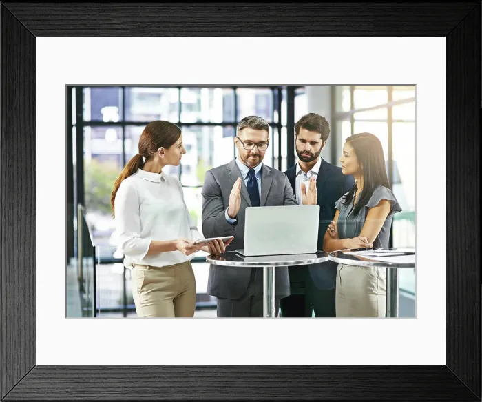 Framed Print : Business man, laptop and meeting with team for presentation of ideas Framed Print : Business man, laptop and meeting with team for presentation of ideas