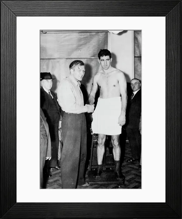 Framed Print : Strickland And Neusel Weigh In For Big Fight -- Walter Neusel (left) Framed Print : Strickland And Neusel Weigh In For Big Fight -- Walter Neusel (left)