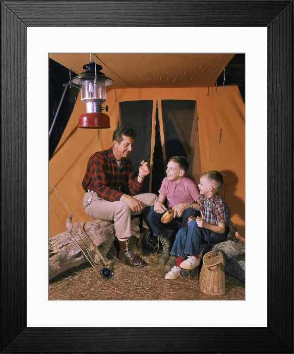 Framed Print : 1950s 1960s MAN FATHER SMOKING PIPE SITTING BY FISHING CAMPING TENT WITH TWO BOYS SONS TELLING STORIES OUTDOORS AT NIGHT Framed Print : 1950s 1960s MAN FATHER SMOKING PIPE SITTING BY FISHING CAMPING TENT WITH TWO BOYS SONS TELLING STORIES OUTDOORS AT NIGHT