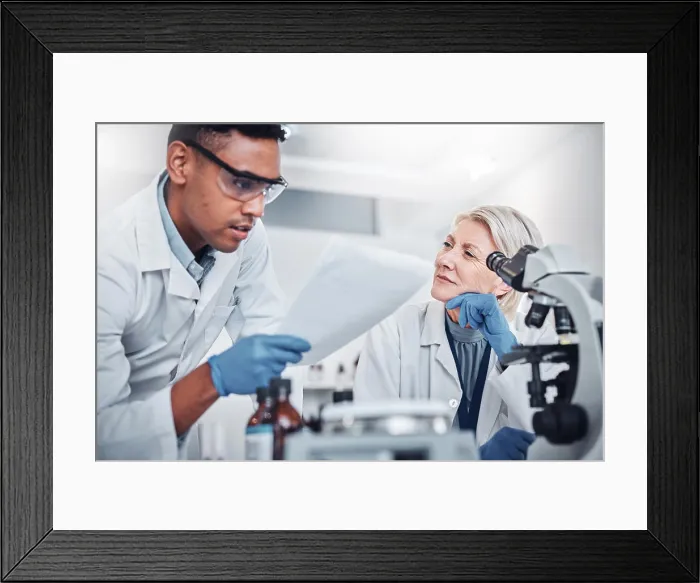 Framed Print : Science, research and team with documents in laboratory for analytics report Framed Print : Science, research and team with documents in laboratory for analytics report