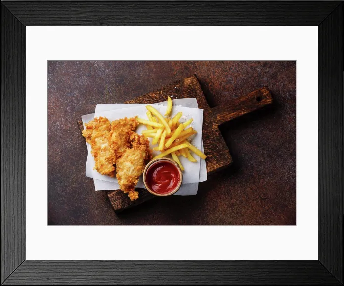 Framed Print : Fish and Chips british fast food with ketchup sauce on dark background Framed Print : Fish and Chips british fast food with ketchup sauce on dark background