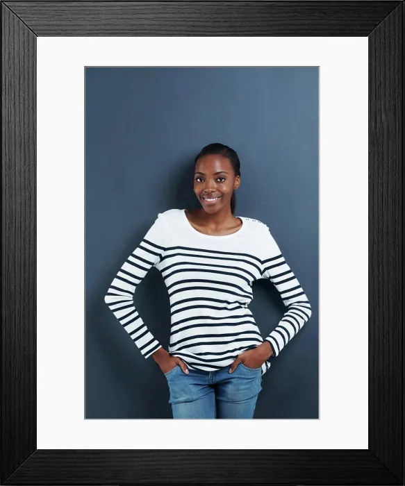 Framed Print : Black woman, happy and portrait in studio with confidence and trendy fashion by blue background Framed Print : Black woman, happy and portrait in studio with confidence and trendy fashion by blue background