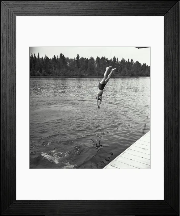 Framed Print : Vintage Photograph. Boy diving in water Framed Print : Vintage Photograph. Boy diving in water