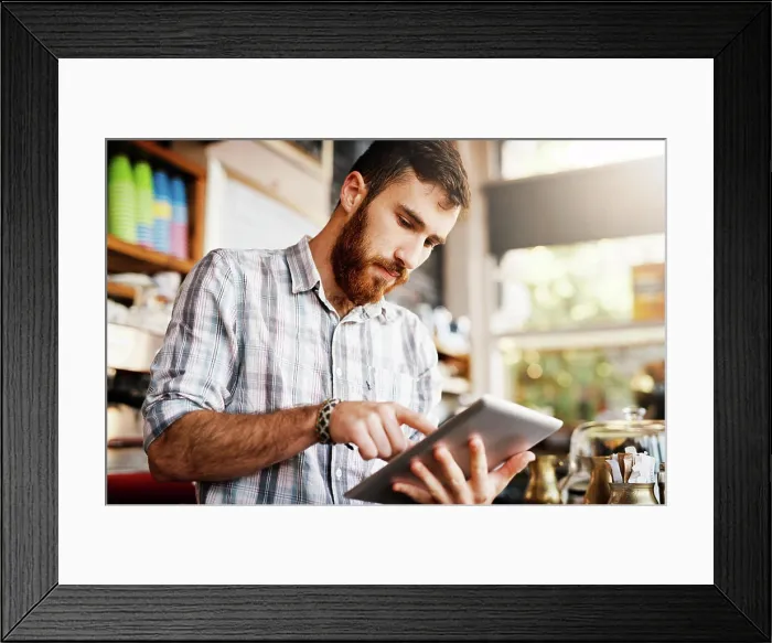 Framed Print : Barista, man and tablet for cafe menu or online order on website in startup coffee shop Framed Print : Barista, man and tablet for cafe menu or online order on website in startup coffee shop