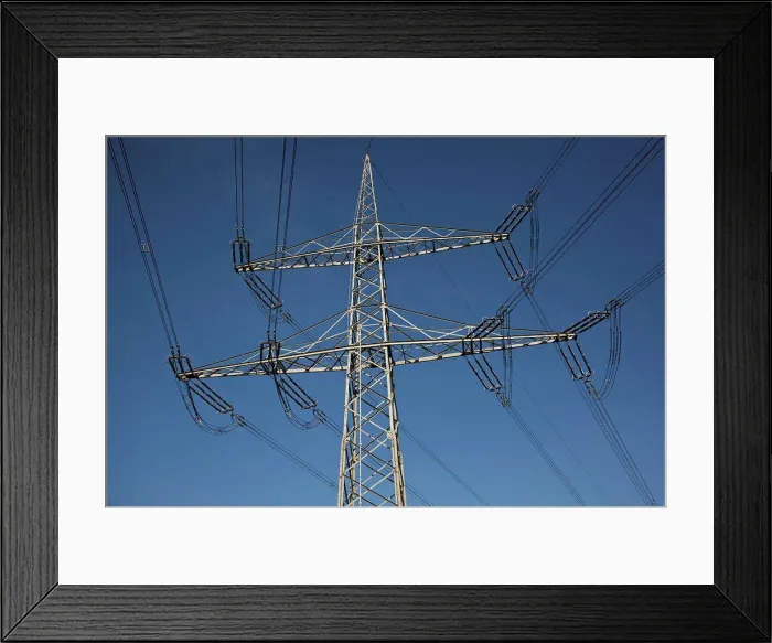 Framed Print : Electricity lines against blue sky Framed Print : Electricity lines against blue sky