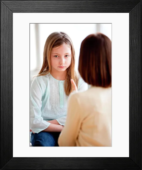 Framed Print : Mother scolding her 9 years old daughter