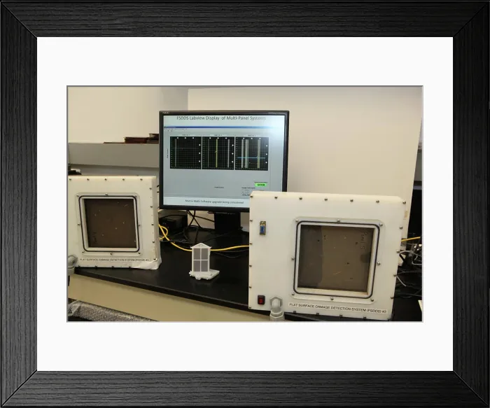 Framed Print : The complete prototype Flexible Damage Detection System stands in a laboratory at NASA's Kennedy Space Center