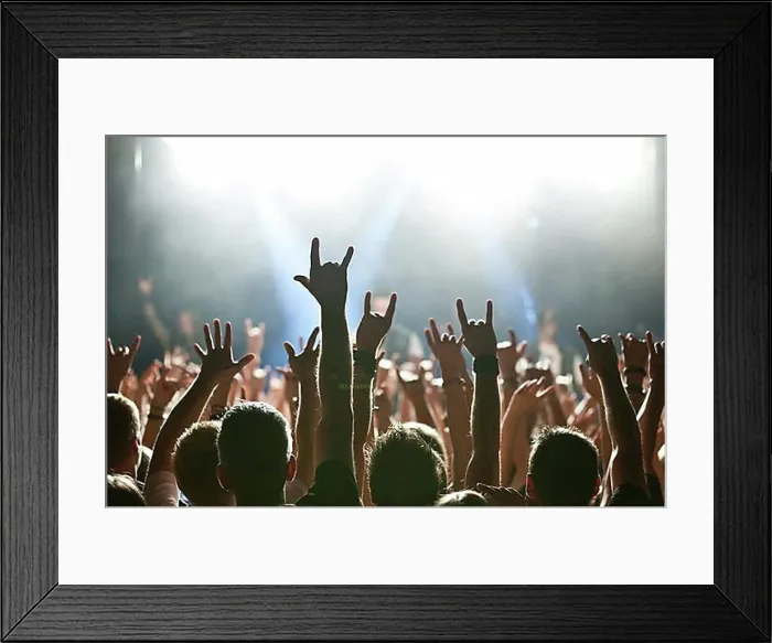 Framed Print : Rocker greeting from fans at rock concert Framed Print : Rocker greeting from fans at rock concert