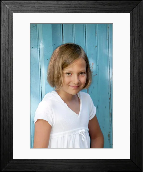 Framed Print : Blond girl looking at camera Framed Print : Blond girl looking at camera