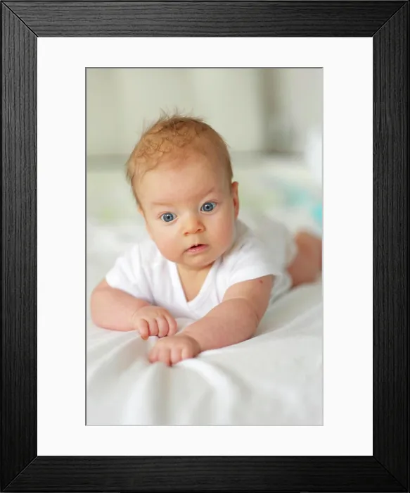 Framed Print : Three months old baby Three months old baby in bed