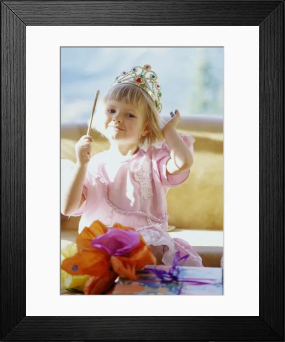 Framed Print : Portrait of a girl wearing a crown smiling