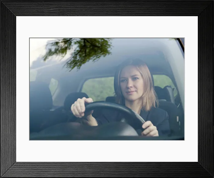 Framed Print : Young woman drivier Young woman driving her car on sunny day Framed Print : Young woman drivier Young woman driving her car on sunny day