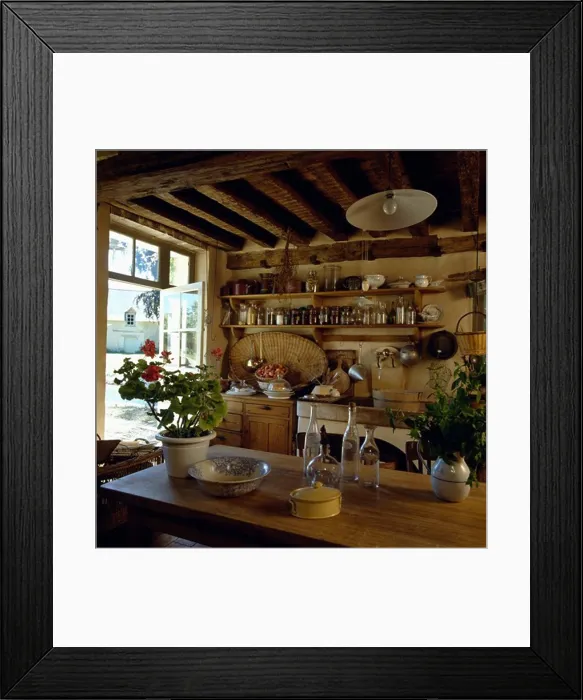 Framed Print : Rustic cottage kitchen with wooden table and shelving Framed Print : Rustic cottage kitchen with wooden table and shelving