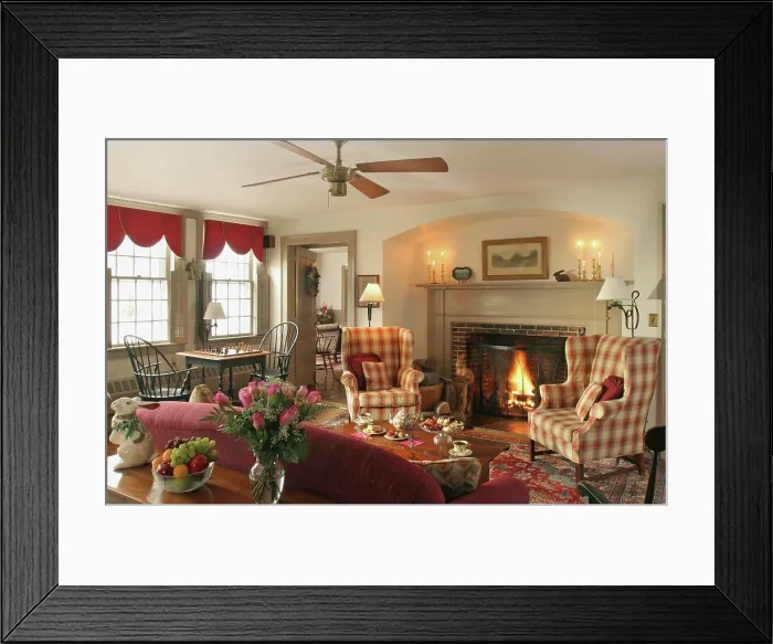 Framed Print : Upholstered furniture arranged around coffee table in front of fireplace with lit fire, Rabbit Hill Inn, Vermont, USA Framed Print : Upholstered furniture arranged around coffee table in front of fireplace with lit fire, Rabbit Hill Inn, Vermont, USA