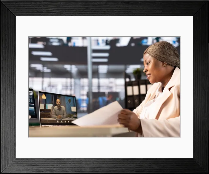 Framed Print : African american businesswoman in online videocall with client Framed Print : African american businesswoman in online videocall with client