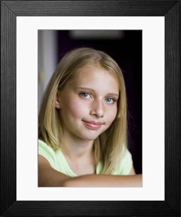 Framed Print : Closeup of girl smiling