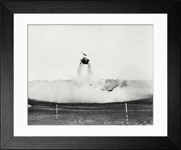 Framed Print : Vintage photograph. Bell helicopter performing Black fly fogging operations Framed Print : Vintage photograph. Bell helicopter performing Black fly fogging operations